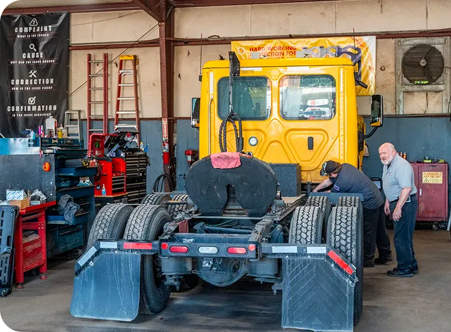 photo mechanic repairing servicing cleaning truck modern clean workshop 1 1
